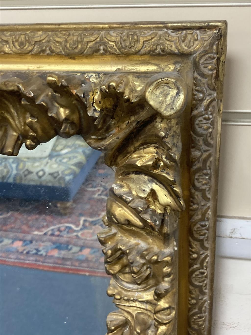 A rectangular giltwood and gesso wall mirror, width 100cm, height 86cm